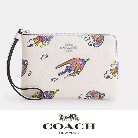 Coach Handbags - Coach Cosmic Coach Corner Zip Wristlet With Rocket Print